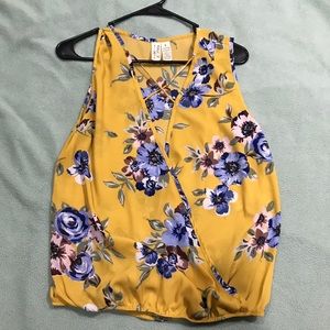 Sleeveless Tank with Plunge V Neck Criss Cross